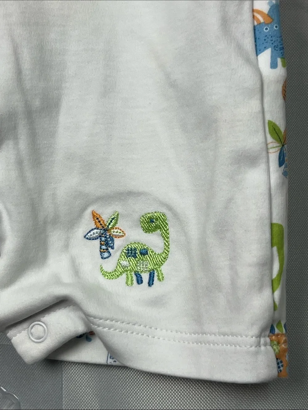 Kissy Kissy one piece dinosaur print and embroidered Pima cotton romper